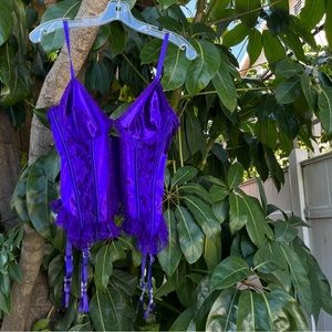 Vintage Y2K Enchanting purple corset with lace detailing and a front clasp
